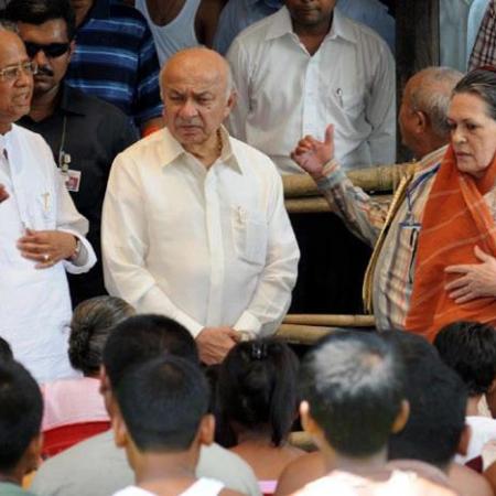 Union Home Minister Sushil Kumar Shinde and National Advisory Council Chairperson Sonia Gandhi along with Assam Chief Minister Tarun Gogoi talking to the riot victims, at Deborgaon Relief camp, in Kokrajhar district of Assam on August 13, 2012.