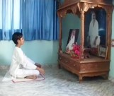 A child deep in meditation