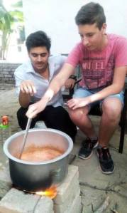 A German student seen cooking at an Indian home during Indo-German cultural exchange programme.